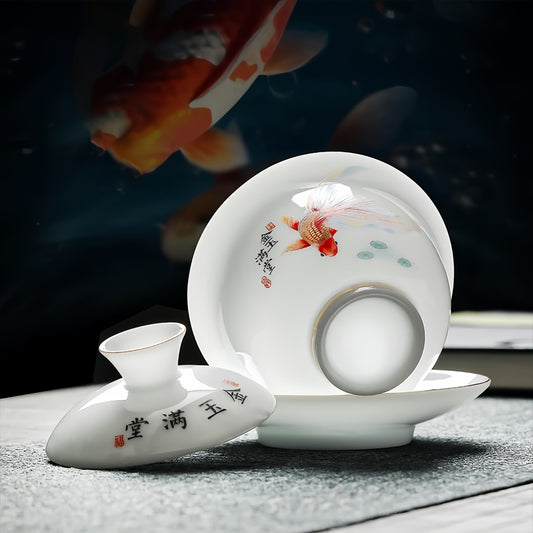 White ceramic teacup and saucer set with goldfish design, YUNGPING Abundant Fortune Icy Jade Porcelain Kunfu Tea Set, 10-Piece
