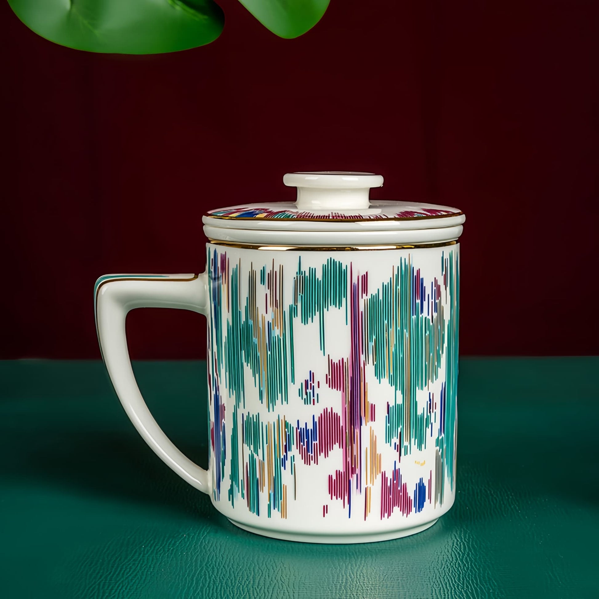 YUNGPING Artistic Lens Fine Bone China Infuser Tea Mug, 3-Piece, styled for a casual afternoon tea.