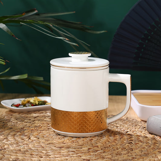 YUNGPING Embossed Gold Fine Bone China Infuser Tea Mug, 3-Piece, styled for a casual afternoon tea.
