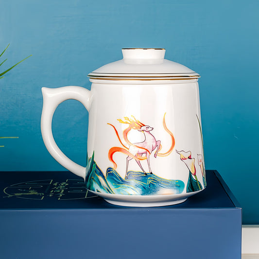 Decorative mug with a colorful deer design on a blue background, YUNGPING Fortune Deer Companion Fine Bone China Infuser Tea Mug, 3-Piece, styled for a casual afternoon tea.