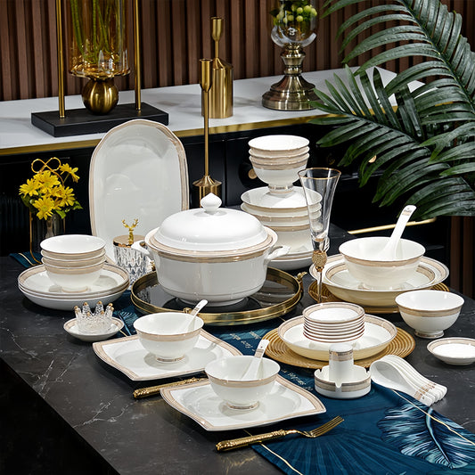 YUNGPING Golden Reverie Fine Bone China Dinnerware Set, 50-Piece, styled on an elegant dining table for formal hosting and special occasions.