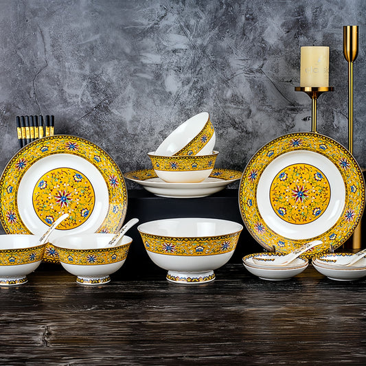 Dishware set with yellow and blue patterns on a dark surface and gray background, YUNGPING The Palace Banquet Fine Bone China Dinnerware Set, 20-Piece, styled on an elegant dining table for formal hosting and special occasions.