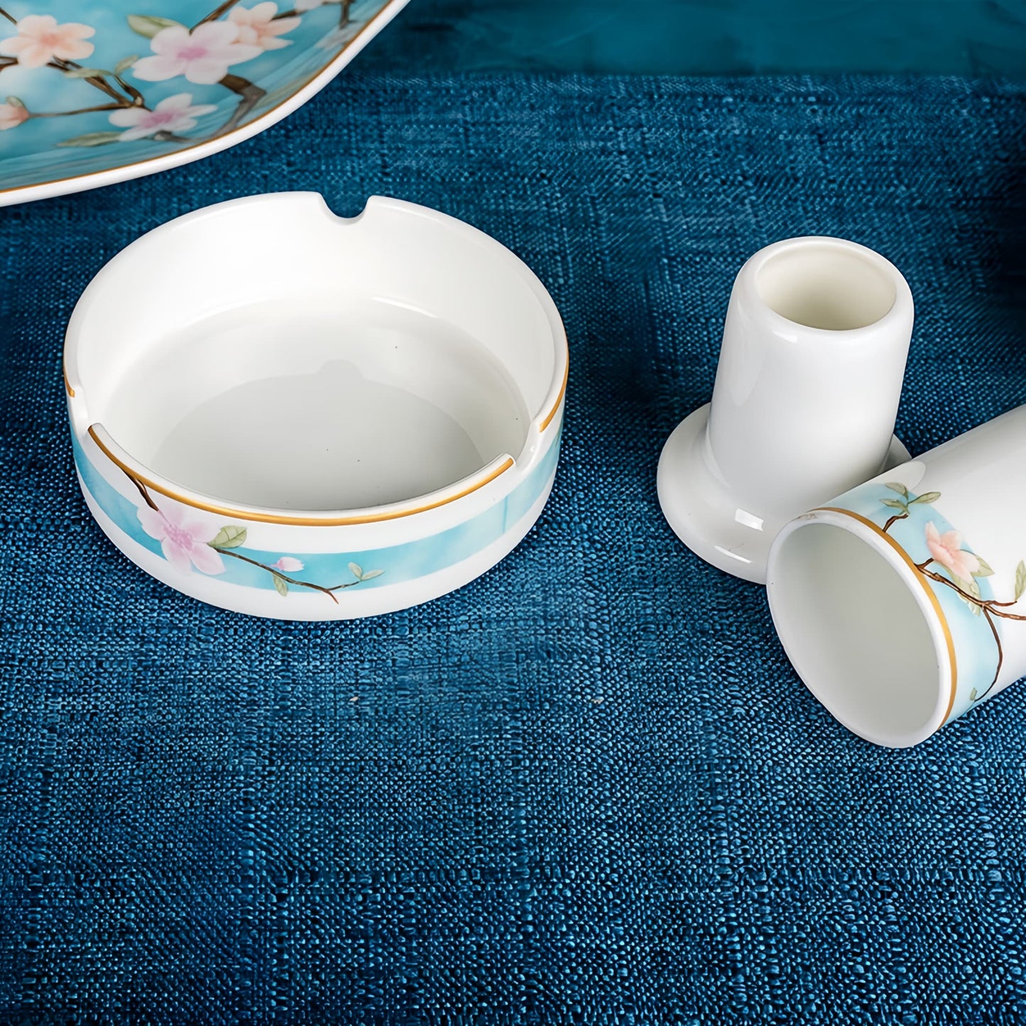 bone china ashtray and cup with floral design on a blue textured surface, YUNGPING Peach Blossom Veil2 Fine Bone China Dinnerware Set, Close-up detail