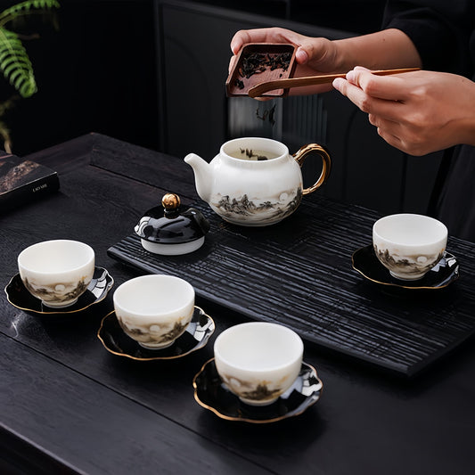 Tea ceremony setup with teapot, cups, and a person using a tea scoop, YUNGPING Sunlit Gilded Mountain Jade Cream Porcelain Kungfu Tea Set, 8-Piece