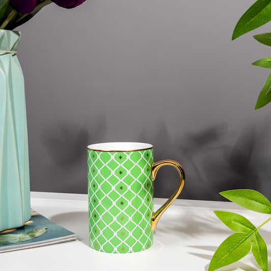 Green patterned mug with gold handle on a white surface with gray background, YUNGPING Vibrant Joy Fine Bone China Mug, 1-Piece, styled for a casual afternoon tea.